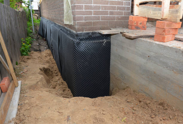 SJ Waterproofing Pros technician performing targeted Waterproofing assessment in Prairie Creek, IN